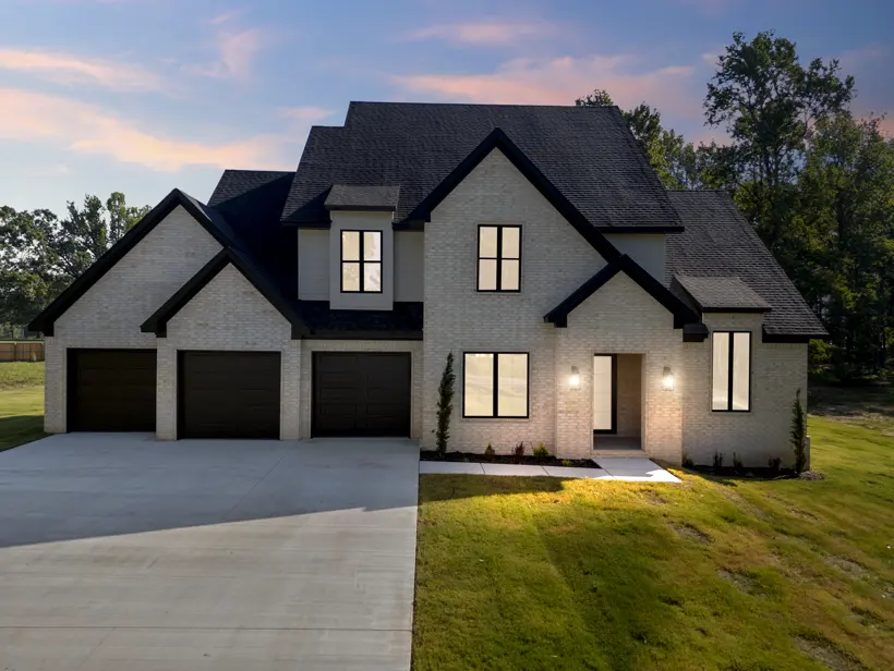 Modern farmhouse at dusk