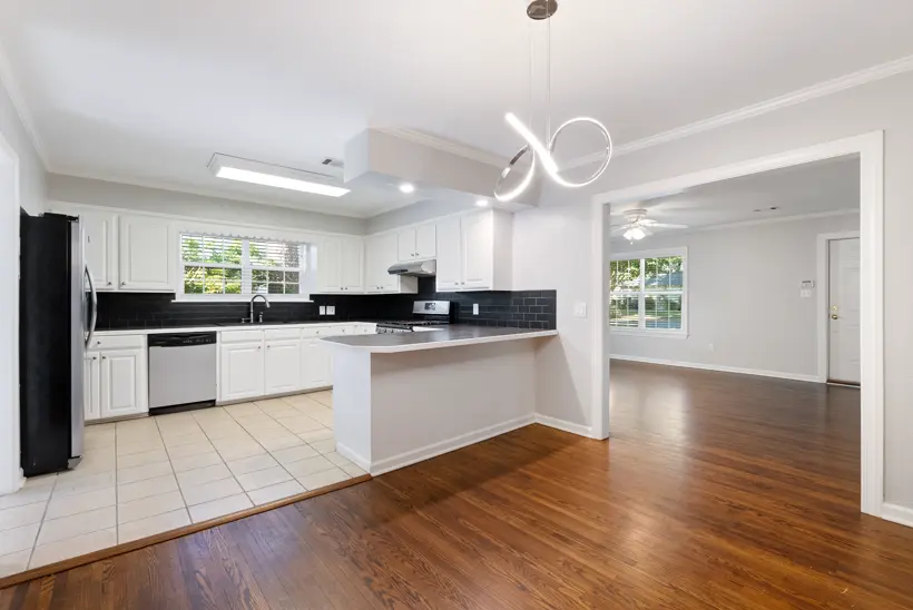 White kitchen with hardwoods