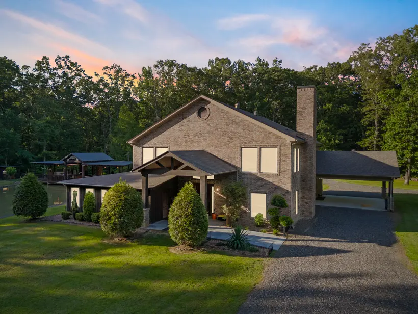 Wooded home at dusk